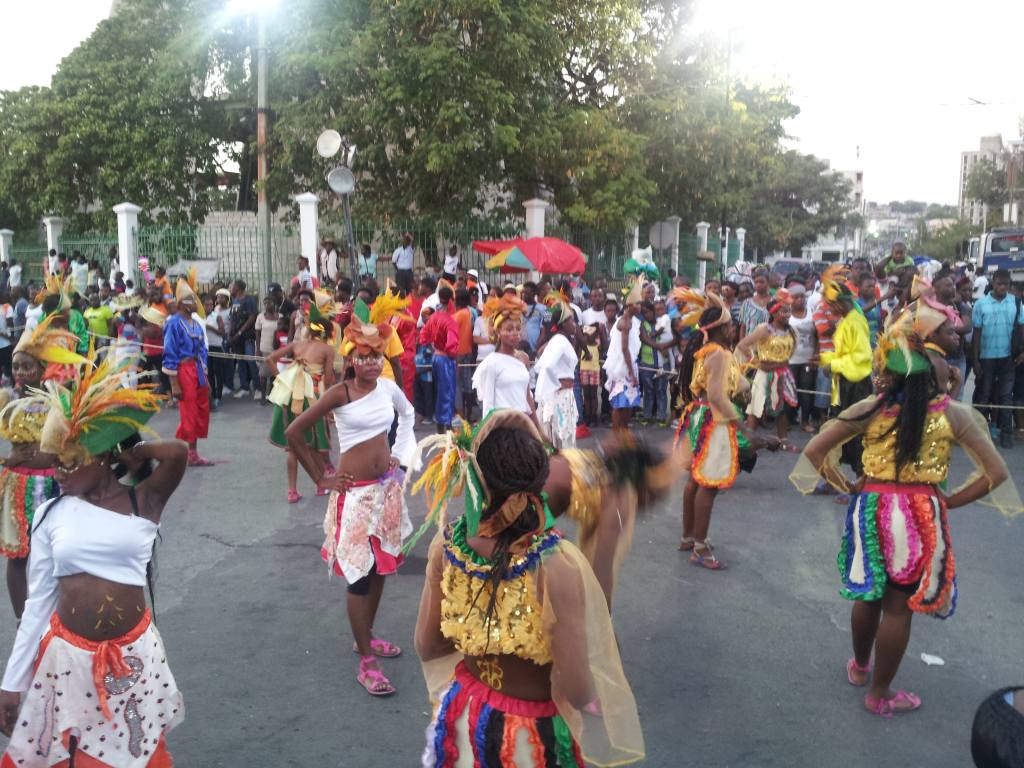 Vibrant Carnival dancers in elaborate outfits in Port-au-Prince