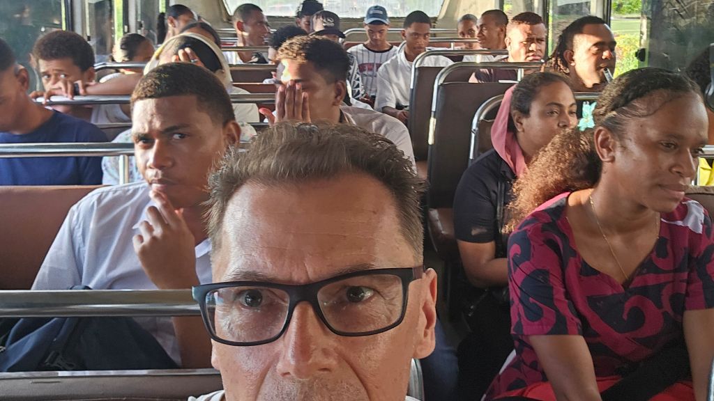 Rok riding a bus between Nadi and Lautoka, Fiji