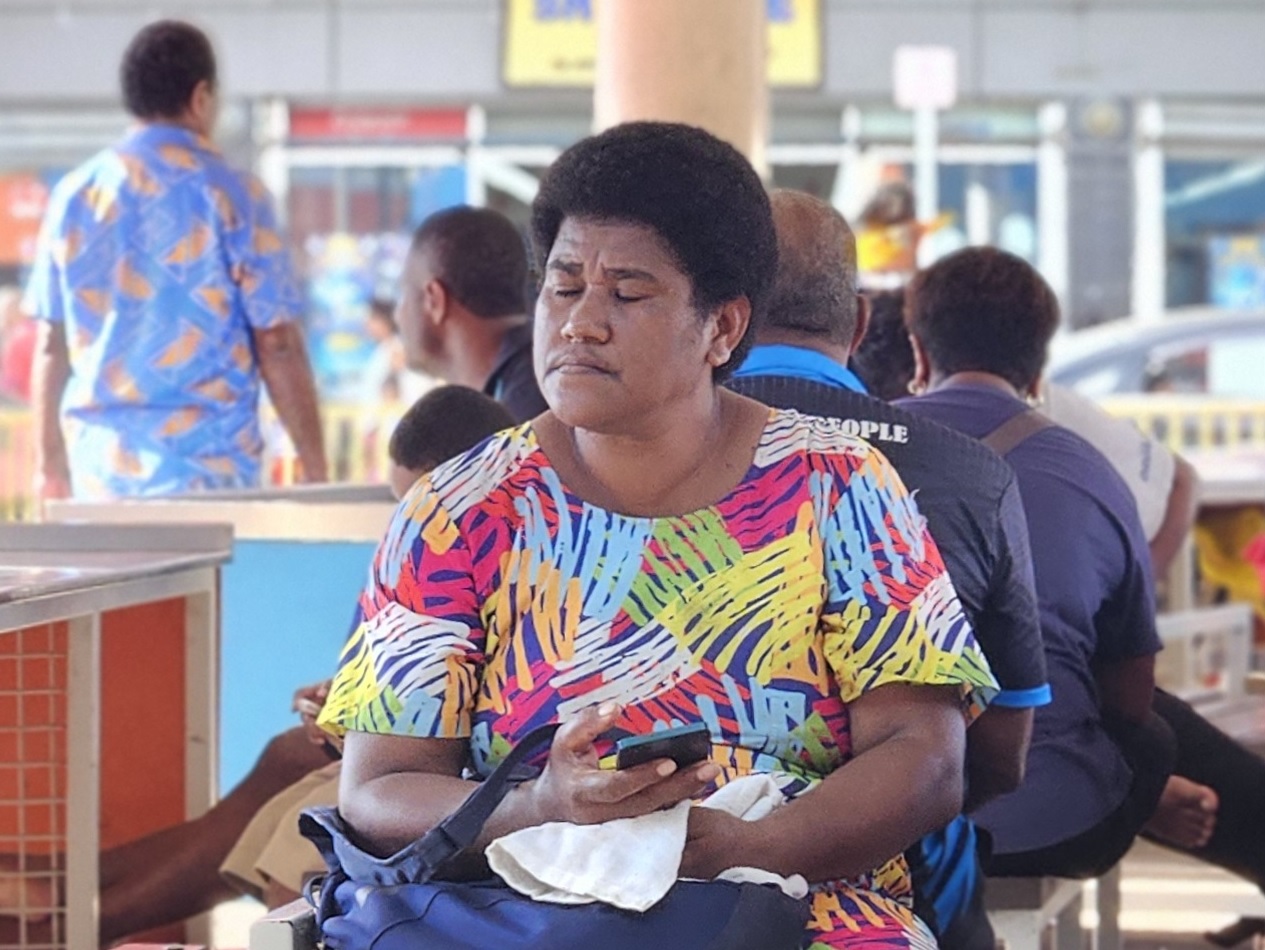 Woman in colorful traditional clothes in Nadi, Fiji