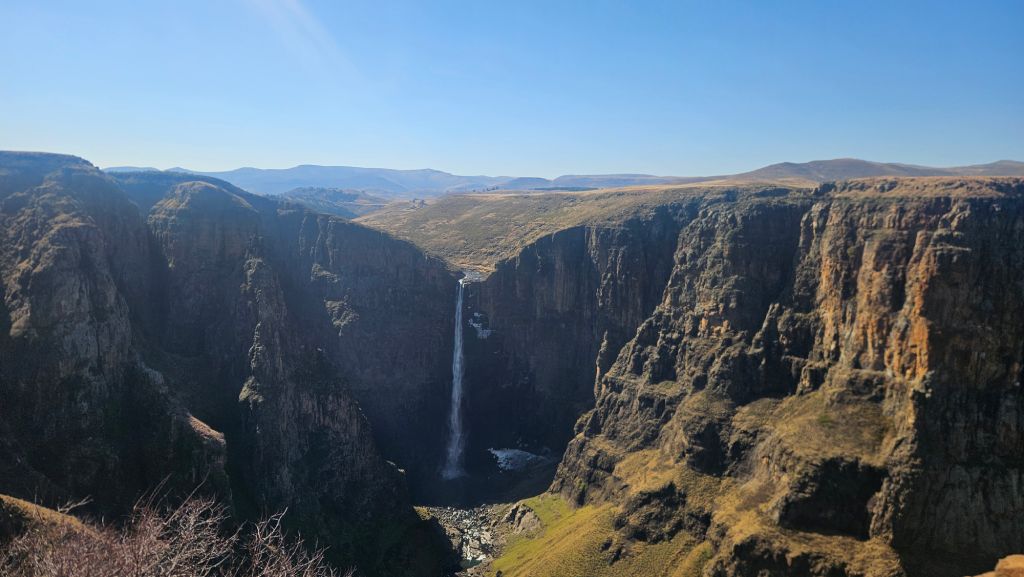 Maletsunyane Falls surrounded by dramatic mountain scenery in Lesotho