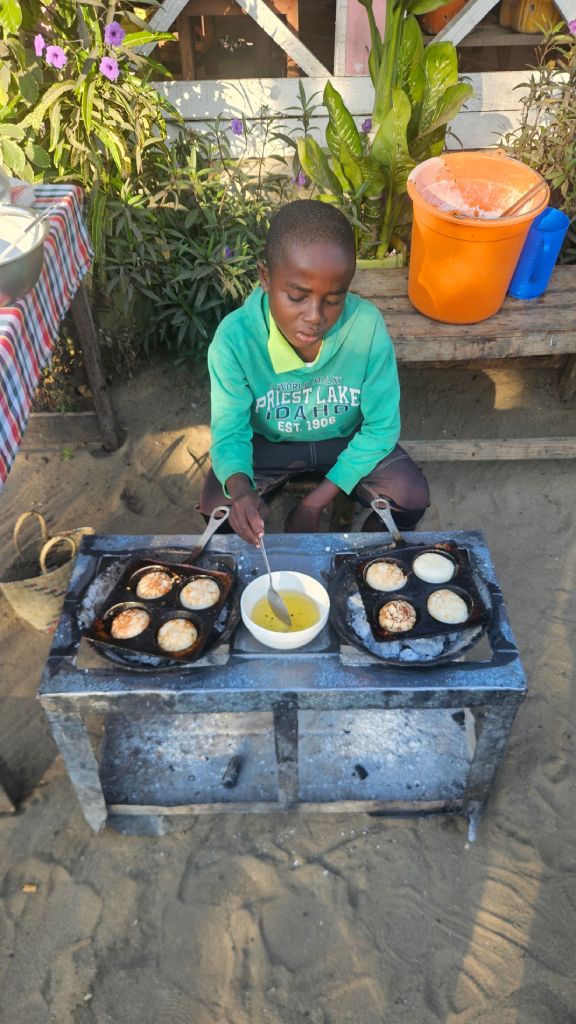Boy_preparing_mofo_gasy