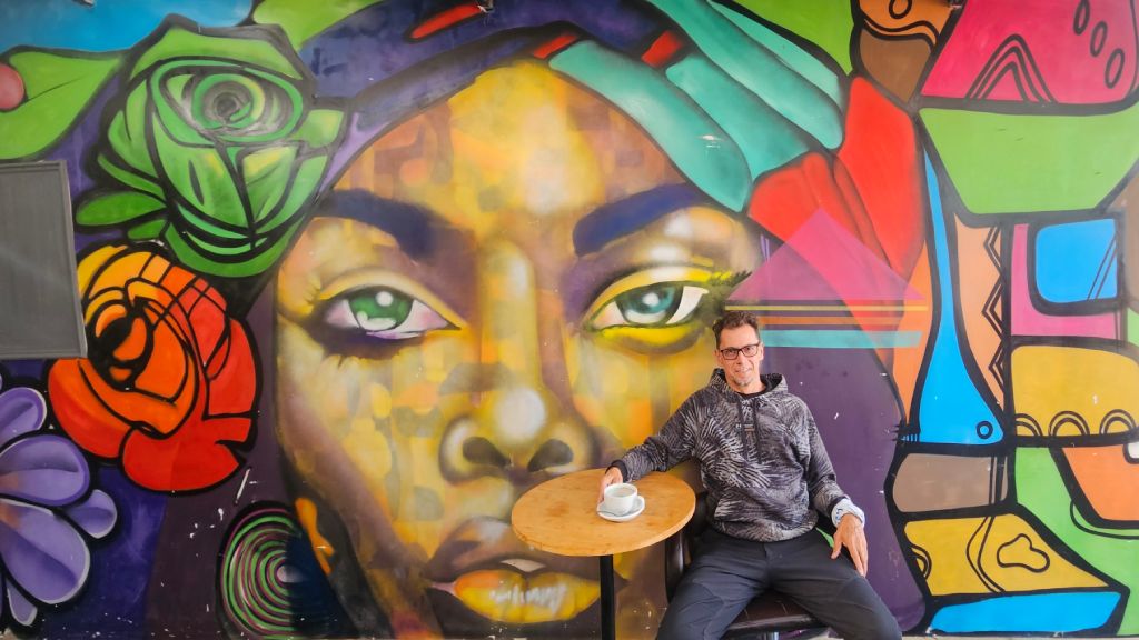 South_Africa_coffee_shop_Rok Rok in front of a colorful mural inside a coffee shop, Johannesburg, South Africa
